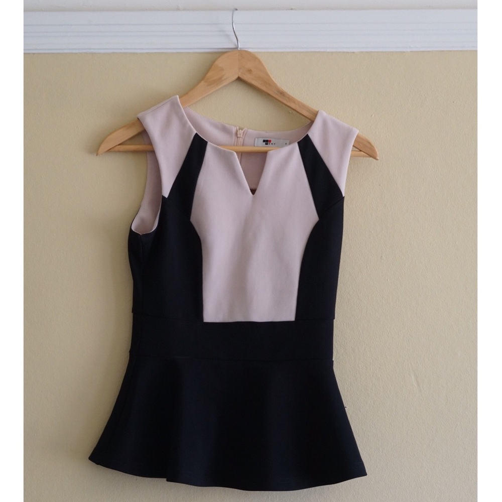 Cream and black colorblock peplum blouse